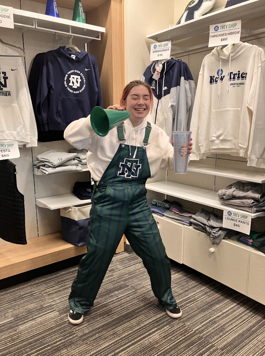 Sophomore Sofia Fernandez wears New Trier-themed merchandise at Winnetka Campus location of One Stop Trev Shop